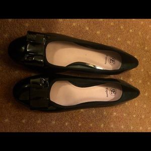Black ballet flats with bow